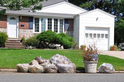 Exterior view of a clean garage in Tring emphasizing clearance services