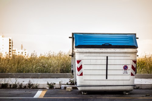 Electric refuse van outside a Tring commercial property